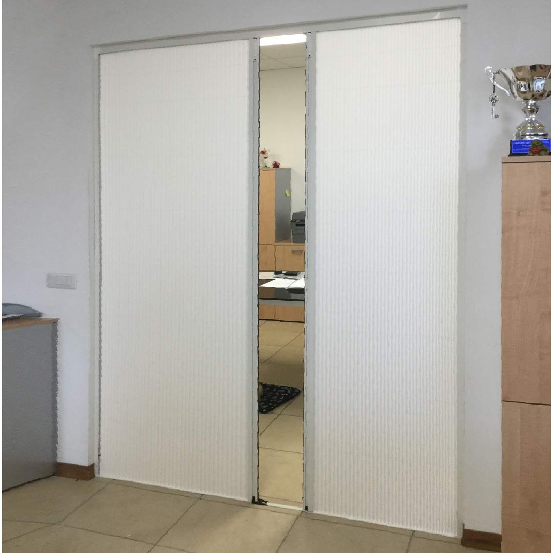 Porta a soffietto in Pvc con guida inferiore